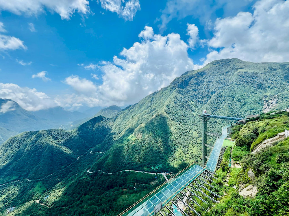 The bridge allows breathtaking views of the valley below, making it a must-visit destination for travelers seeking adventure and stunning scenery